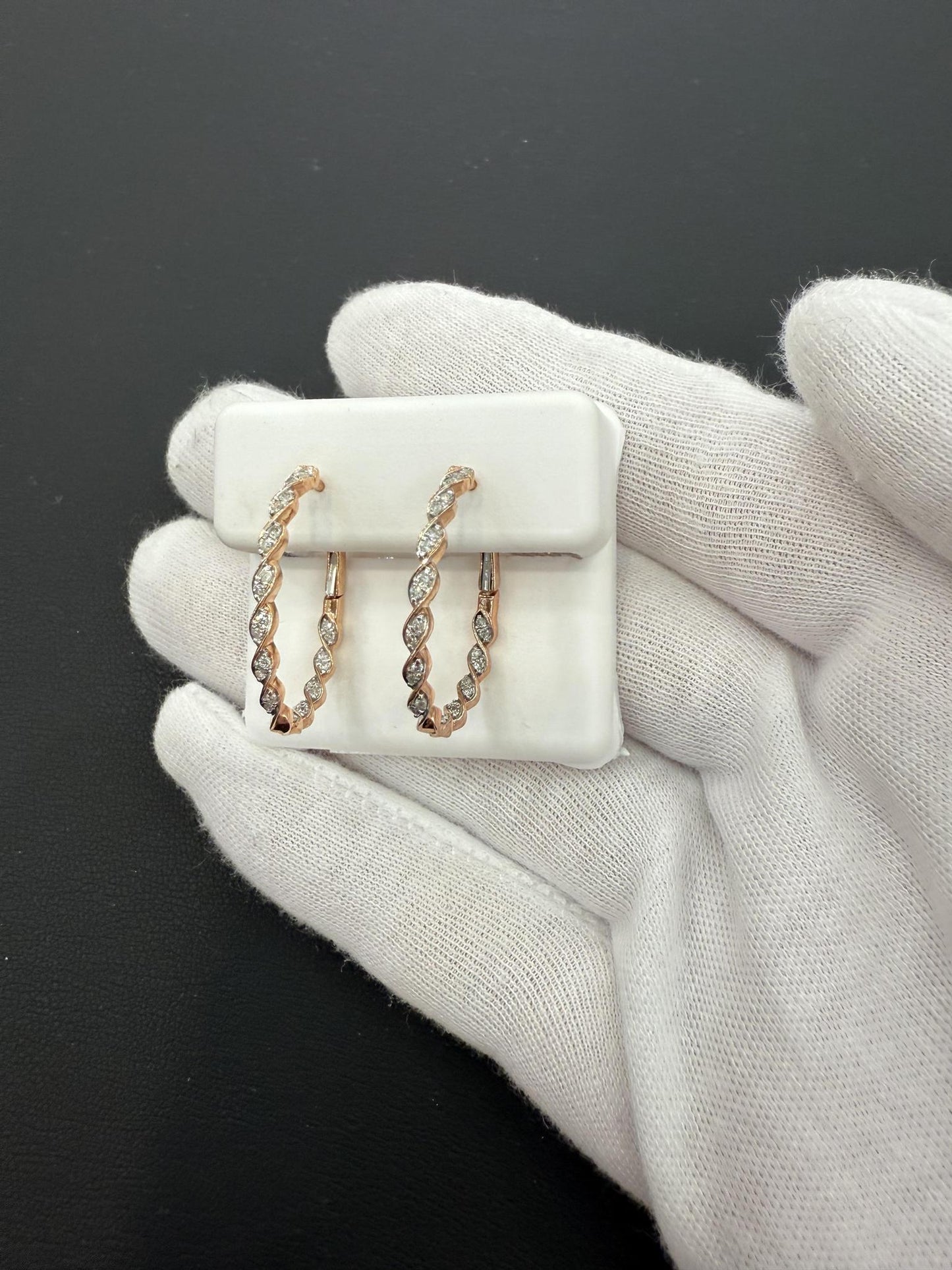 0.25 cttw Diamond Twist Inside Out Oval Hoop Earrings 10k Rose Gold