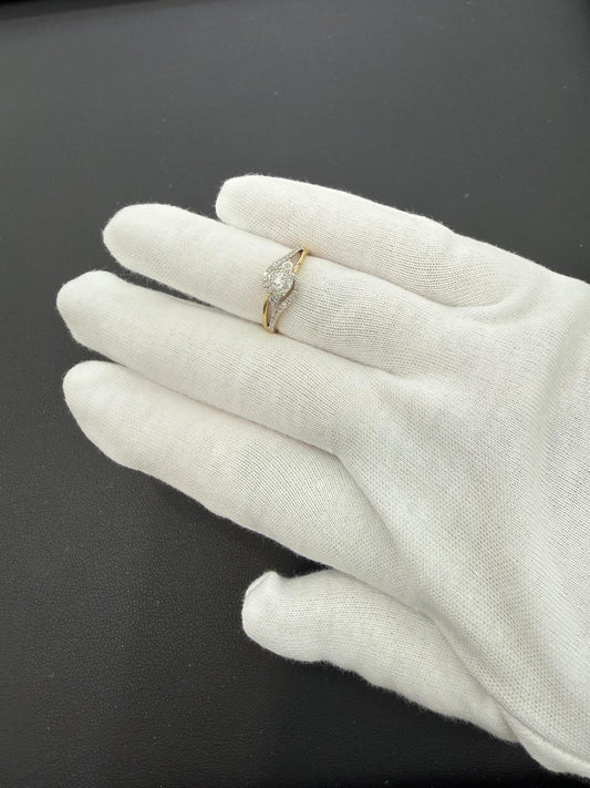 0.25ctw Diamond Halo Bypass Engagement Ring 10K Yellow Gold